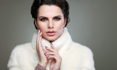 A photo of sexual beautiful girl is in fur clothes